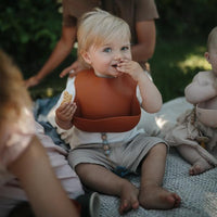 Mushie Silicone Baby Bib, Clay - Hello Little Birdie