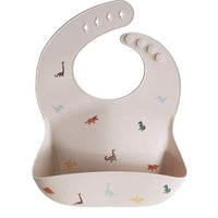 Mushie Silicone Baby Bib, Dinosaurs - Hello Little Birdie