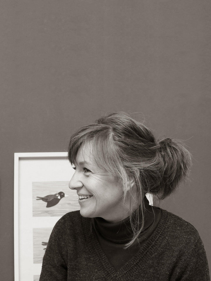 Headshot of Esther Schuivens, founder of Ted + Tone in front of Ted + Tone print