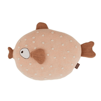 OYOY Children's cushion in the shape of a pink fish with white polka dots, and terracotta pout and fins.